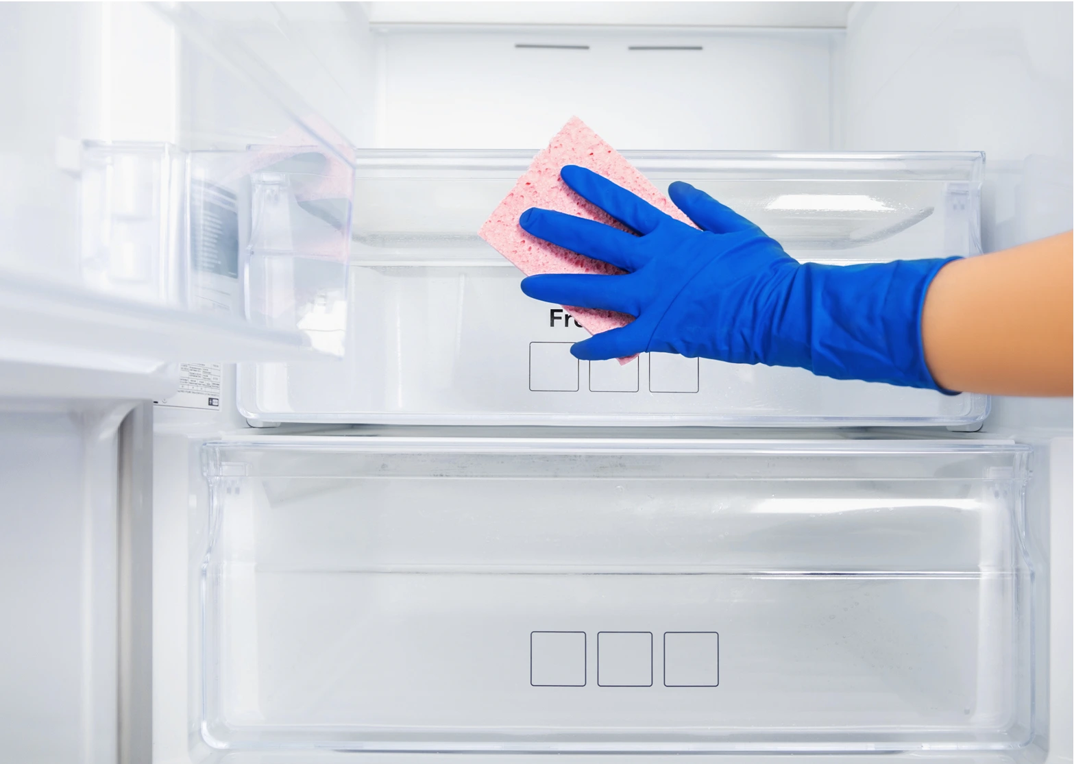 befor-after-female-hand-washes-the-refrigerator-sh-2025-01-09-04-35-32-utc 2